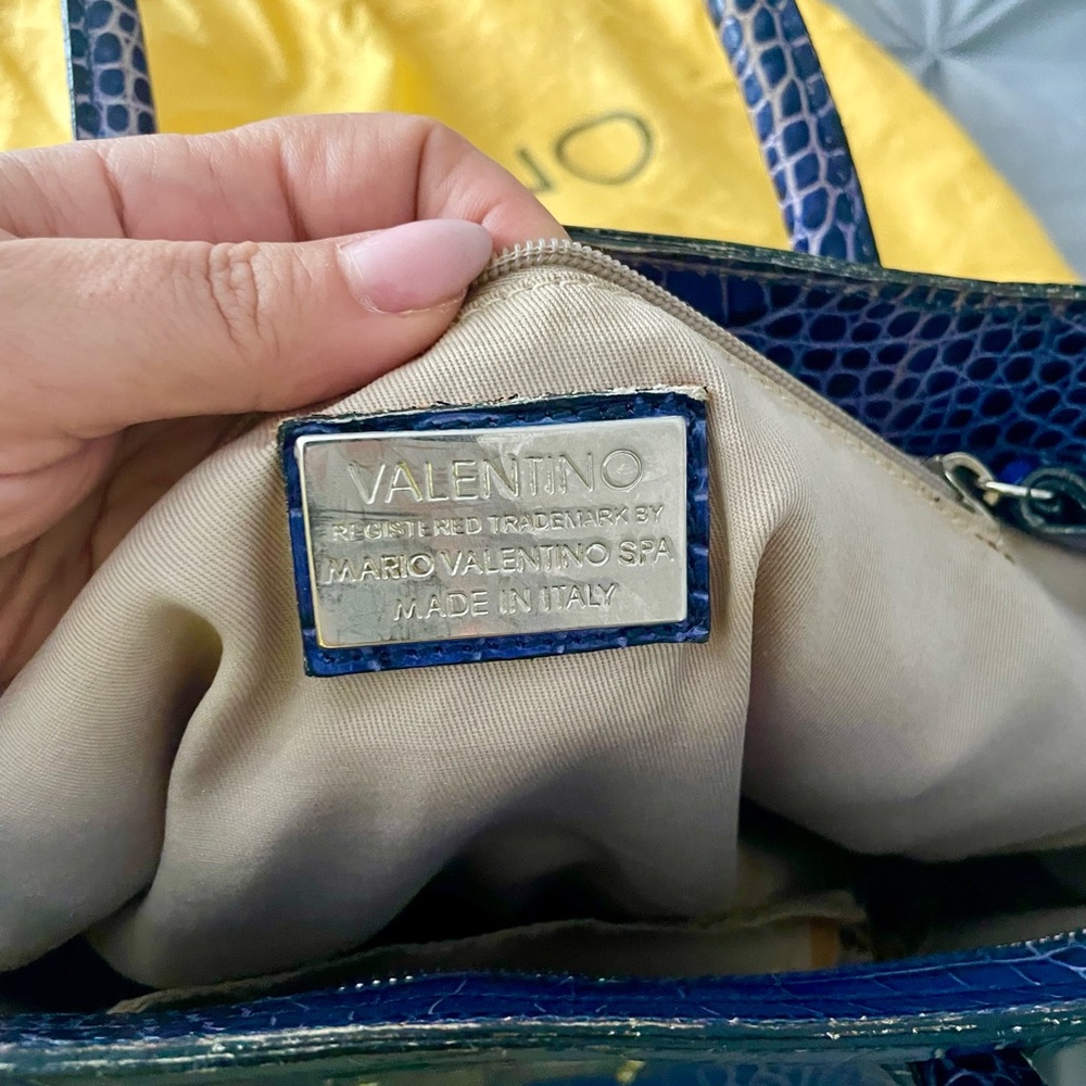 Used. Need some dry cleaning and repair of inside fabric. Had dust bag